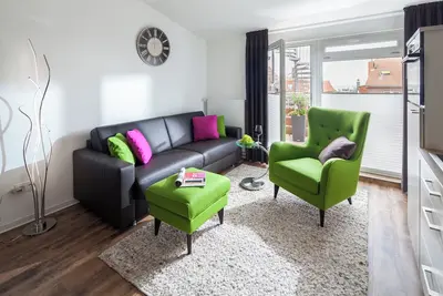 Image de Modern apartment with box-spring bed, sunny balcony and view of the Wadden Sea