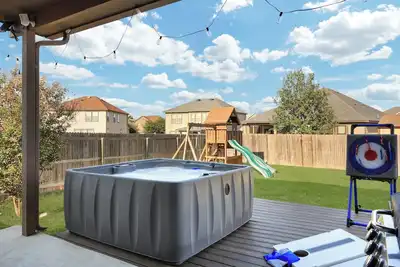 Image de Hot Tub Retreat | Games Bbq Air Hockey Swing Set