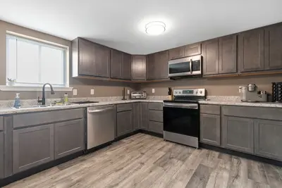 Image de Lovely 2-bedroom apartment with Wifi/Private Parking/Laundry