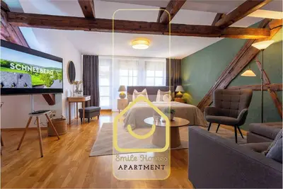 Image de Rooftop suite with private sauna above the rooftops of Schneeberg