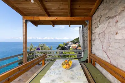 Image de Appartement d'une chambre avec la terrasse et la vue sur le mer Baie Pobij, Hvar (A-7506-c)