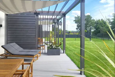 Image de Maison de vacances 'Schlossterrassen 8b' avec vue sur le lac, terrasse privée et Wi-Fi