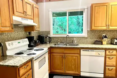 Quiet cabin among the trees.