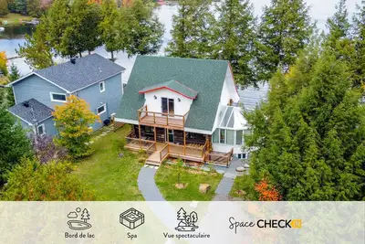 Image de Chalet Pommette | Spa | Plage de Sable | Kayaks & Chaloupe | Foyers int. et ext.