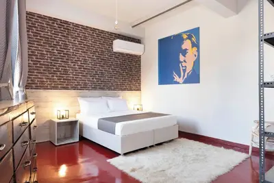 Image de The Industrial Loft • Private Rooftop & Jacuzzi