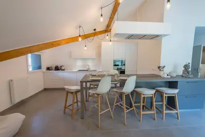 Image de L'Elegance - Appartement de charme aux pieds de la montagne du Taillefer