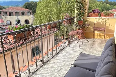 Image de Casa Luisa, in the historic center of Lucca, with breathtaking views of the rooftops of Lucca