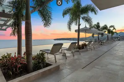 Image de Bantay 1d | Beachfront 3br Condo w/ Ocean Views + Pool + Daily Housekeeping