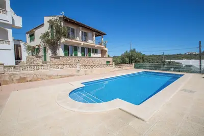 Image de S'Algueret - Cozy house with shared pool and sea views in Portopetro - Free Wi-Fi