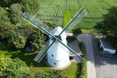 Image de Maison de vacances 'Moulin à vent Betty à la mer du Nord' avec terrasse privée, jardin privé et Wi-Fi