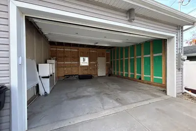 Image de Three-bedroom House with Garage and Fenced Backyard