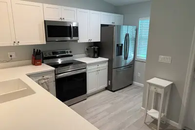 Image de 3-bedroom house in charming Stuart with Ac, fitness room. Start relaxing