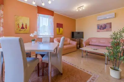 Image de Appartement de vacances avec de l'air conditionné et un accès Internet