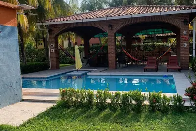 Image de 3-bedroom house in fabulous Los Cobanos with Ac, Surrounded by trees and birds