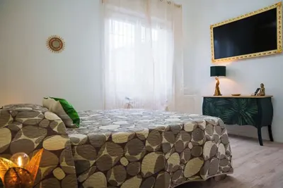 Image de Gabri's House has 3 rooms with 3 private bathrooms and a kitchen available