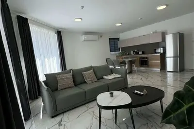 Image de Bright Corner 2-Bedroom Apartment – by HostMT