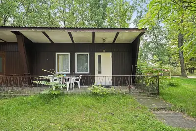 Image de Bungalow « 1 - Kimbucht » avec terrasse privée et jardin commun