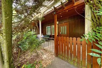 Image de Bungalow '24 - Kimbucht' avec terrasse privée et jardin commun