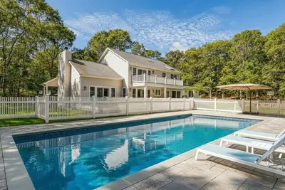 Image de Resort-style Southampton retreat with heated pool, chic interiors, and. . .