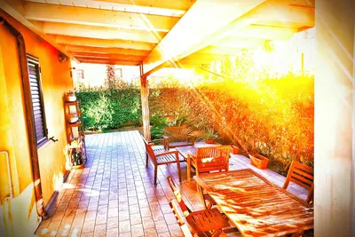 Image de Cozy family apartment just minutes from the sea with outdoor courtyard