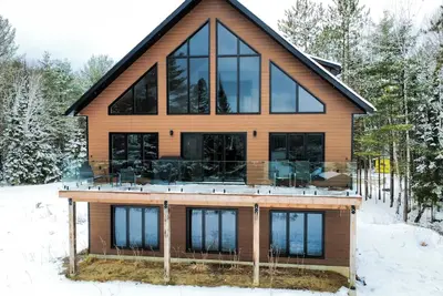 Image de Chalet de L’Achigan - Grand chalet familial avec vue & accès direct à l’eau