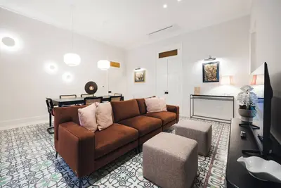 Image de Warm, bold, and modern—Balluta 12. 2 The Baroness exudes luxury through earthy tones, plush textures, and artistic flair, all set in a historic palace overlooking the calm beauty of Balluta Bay.