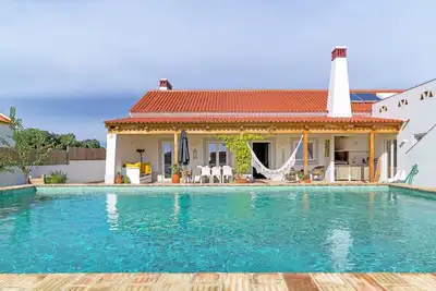 Image de Villa 'Do Medronheiro' avec piscine privée, terrasse privée et Wi-Fi