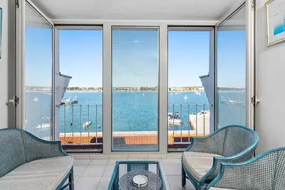 Image de Appartement de vacances avec climatisation et vue sur la mer