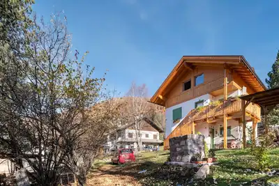 Image de Maison de vacances « Ciasa La Cate » avec vue sur la montagne, terrasse privée et Wi-Fi
