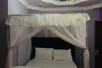 Image de 🌿 Cozy 3-Bedroom Retreat in the Heart of Arusha Town 🌿