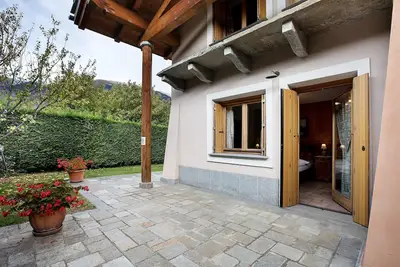 Image de Appartement 'Trilocale 6' avec vue montagne, terrasse commune et Wi-Fi