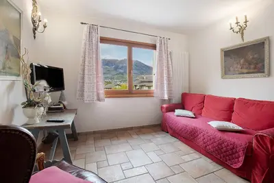Image de Appartement 'Trilocale 9' avec vue montagne, terrasse partagée et Wi-Fi