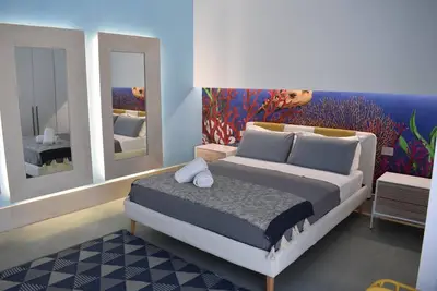 Image de Appartement 'Bianco Mare Delfino' avec balcon, Wi-Fi et climatisation