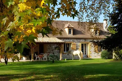 Image de Chambre d’hôtes « Chambre Familiale Carpediem » avec jardin partagé, Wi-Fi et climatisation