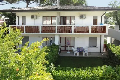 Image de Appartement dans une villa avec jardin privé