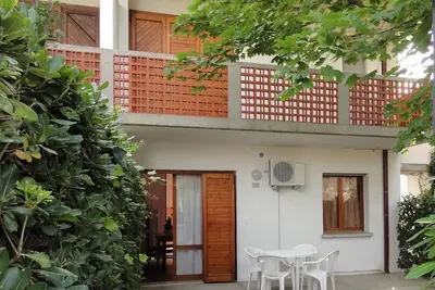 Image de Appartement dans une villa avec jardin privé