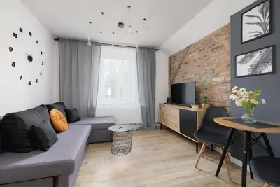 Image de Betonowa 4 Czeladź | Brick Cozy Apartment | Remote Work