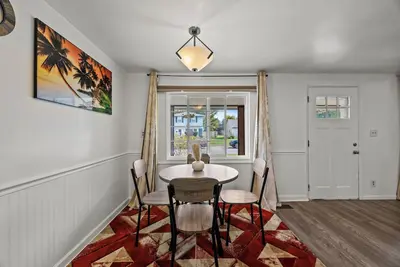 Image de Charming 3-bedroom house with fitness room and Ac in lovely Columbus. Cozy home