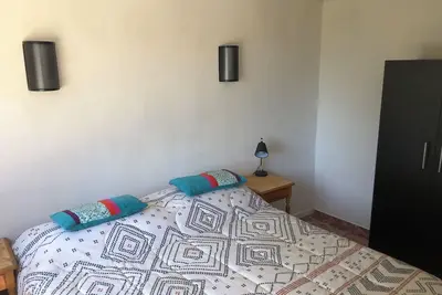 Image de Independent furnished cabin with terrace and grill, steps from Playa Negra.