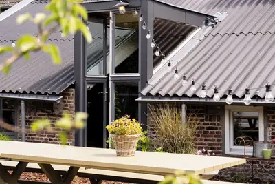 Image de Attractive and luxurious farmhouse for groups! A 5-minute drive from the heart of Maastricht