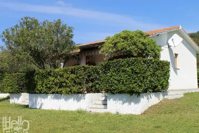 Image de On the ground floor and with an equipped veranda, it consists of a small living room with kitchen co