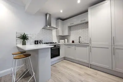 Image de Confort-Vue sur Rue-Maison-Salle de bain privée