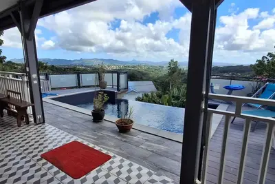 Image de Homerez - Appartement confortable à Saint-Joseph avec piscine