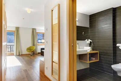 Image de Chambre « Hotel Schweigl Suite 203 » avec vue montagne, piscine partagée et Wi-Fi