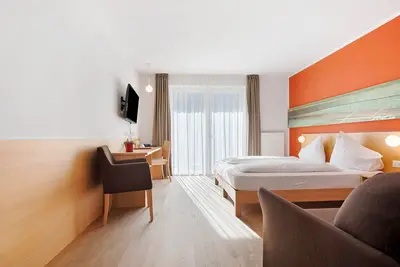 Image de Chambre 'Kreativ Hotel Schweigl Dz 101' avec vue montagne, piscine commune et Wi-Fi