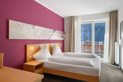 Image de Chambre 'Kreativ Hotel Schweigl Dz 107' avec vue montagne, piscine partagée et Wi-Fi
