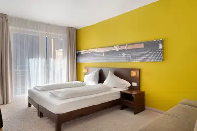 Image de Chambre 'Kreativ Hotel Schweigl Dz 113' avec vue montagne, piscine commune et Wi-Fi