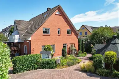 Image de Quietly situated vacation apartment - Ferienhaus Weingarten FeWo zum Bodden -