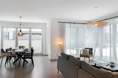 Image de Appartement 'Strandbude Dangast' avec terrasse privée, jardin commun et Wi-Fi