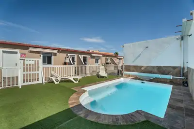 Image de Appartement de vacances '1 Omanai Tenerife Sur' avec terrasse, jardin privés et Wi-Fi